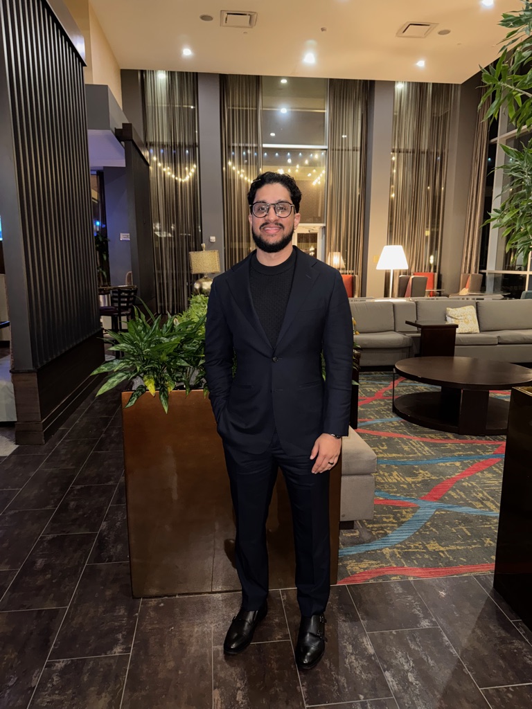 Abdul Javed, in a navy suit